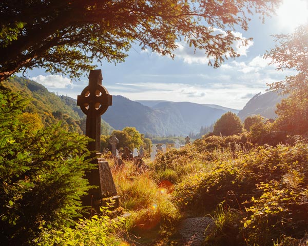 celtic cross monument standing in the scenic landscape