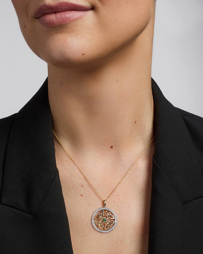 14k gold emerald round trinity knot pendant s46403 on a model 1