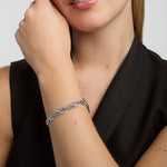 close-up image of cz celtic knot link bracelet presented on a female model