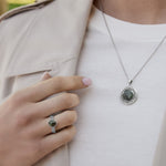 connemara marble celtic knot ring and necklace set on a model