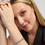 lifestyle image of Solvar silver celtic knotwork link bracelets on a female model