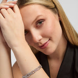 lifestyle image of Solvar silver celtic knotwork link bracelets on a female model