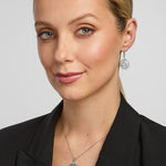 ladies matching celtic spiral necklace and earrings on a model
