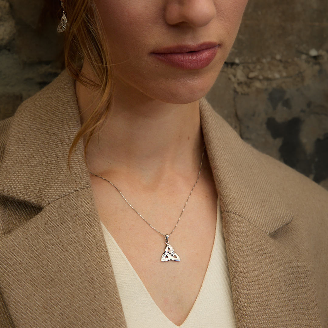 lifestyle image a female model wearing Celtic Trinity Knot pendant