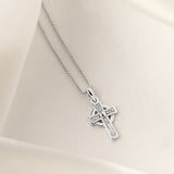lifestyle image of kid's Celtic Cross necklace in silver