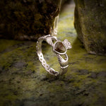 styled image of sterling silver connemara marble claddagh weave ring s2887 from Solvar