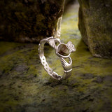 styled image of sterling silver connemara marble claddagh weave ring s2887 from Solvar
