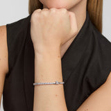 close-up image of Cz Claddagh tennis bracelet on a woman's wrist