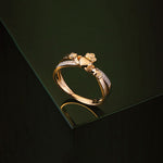 styled image of 14k gold diamond claddagh crossover ring s21065 from Solvar 