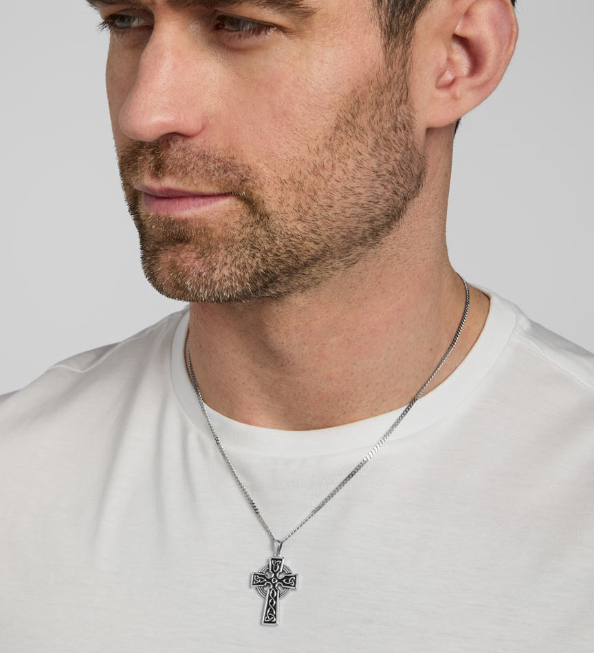 a male model wearing heavy double-sided Celtic Cross pendant from Solvar