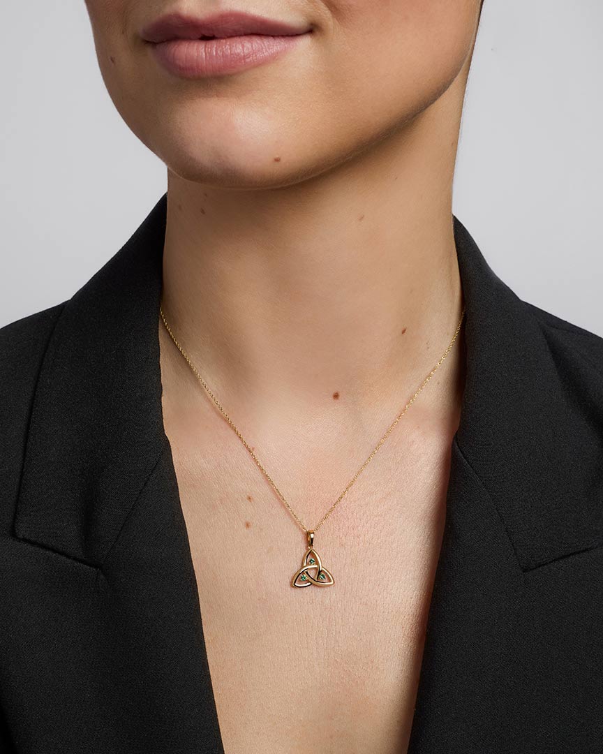 10k gold emerald trinity knot pendant s45717 on a model 2