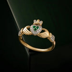 styled image of 14K gold diamond and emerald set claddagh ring s2945 from Solvar