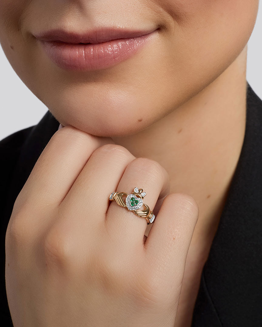 14K gold diamond and emerald set claddagh ring s2945 from Solvar on a model 2