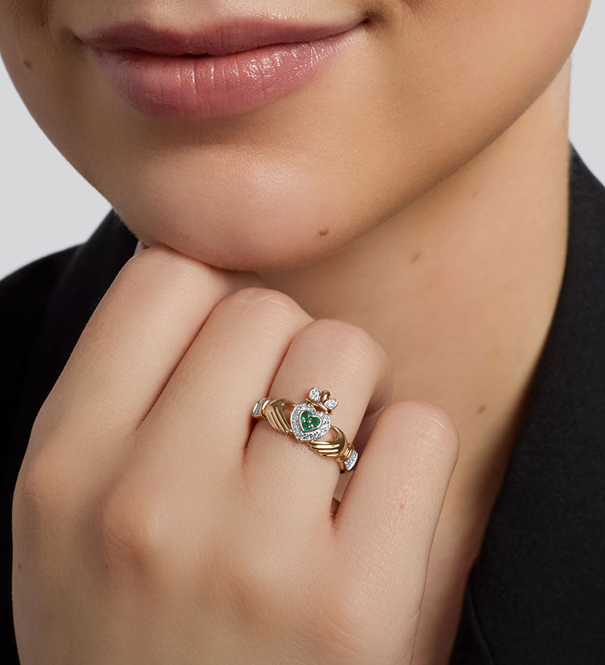 14K gold diamond and emerald set claddagh ring s2945 from Solvar on a model 2