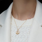 14K Gold Flush Set Diamond Claddagh Necklace S46968 on a model 2