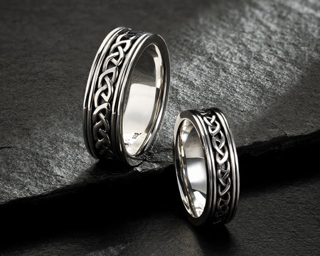 styled image of two silver celtic knot bands