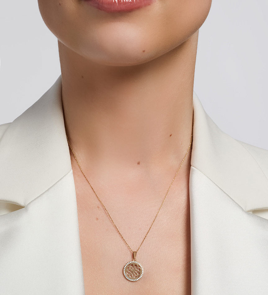 celtic round trinity knots necklace presented on a model