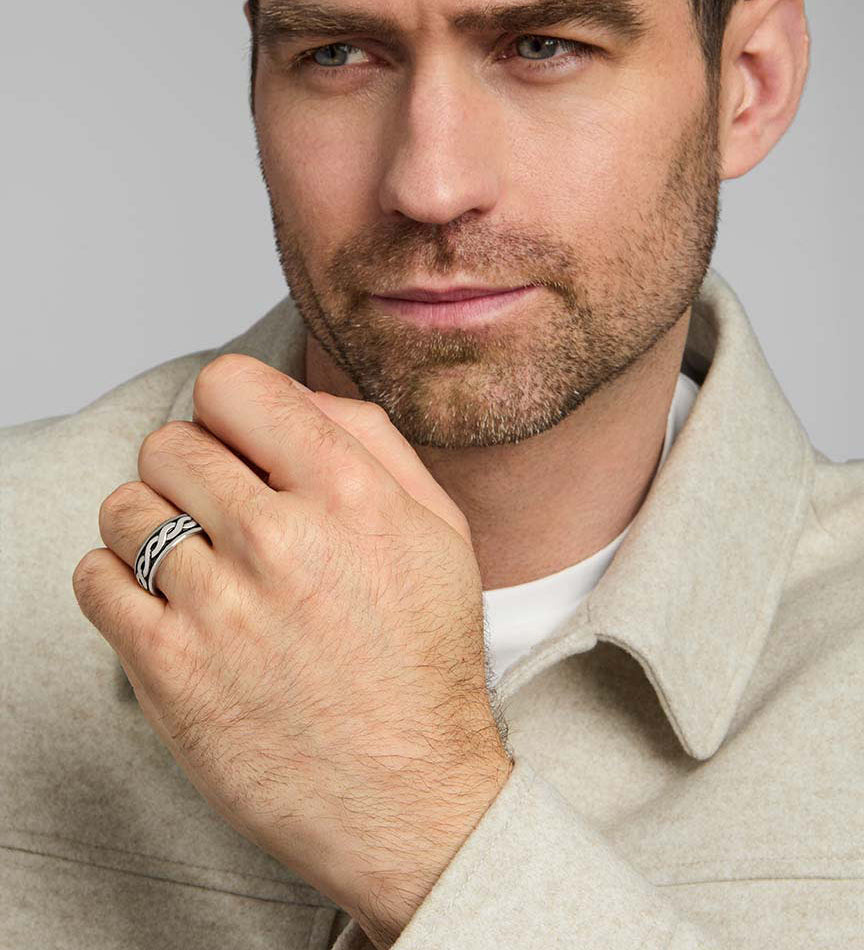 a male model wearing silver celtic knot ring from Solvar