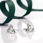 styled image of 14K white gold emerald trinity knot stud earrings s3007 from Solvar