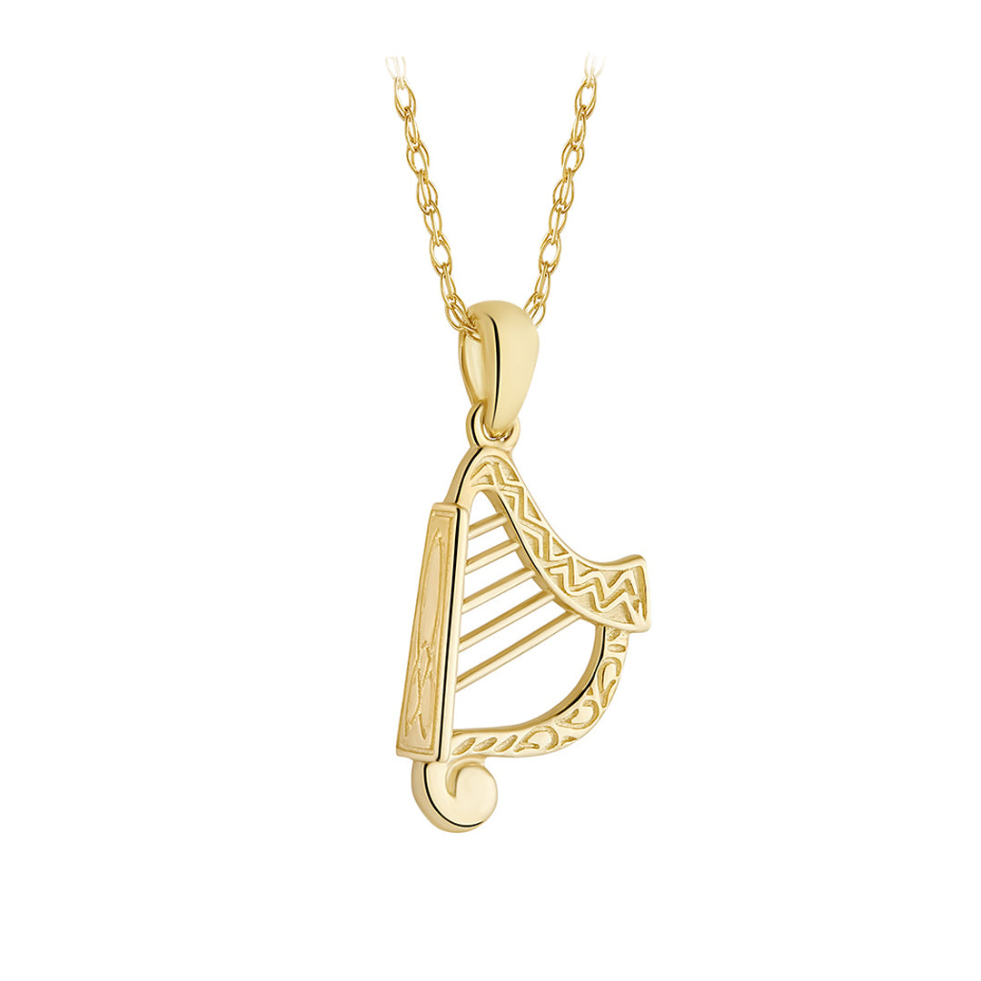 Gold harp-shaped pendant on a chain against a white background