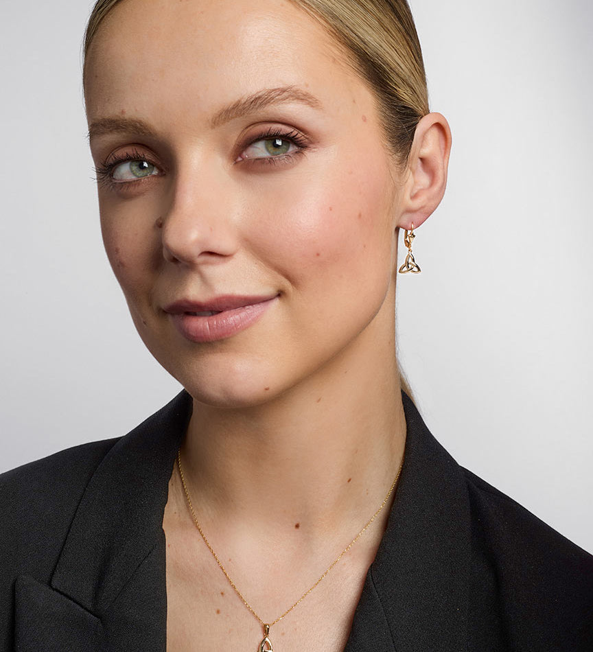14k gold trinity knot drop earrings s3734 on a model 1