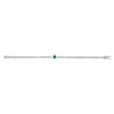 Image showcasing the green cubic zirconia  Claddagh heart tennis bracelet laid out in its open state.