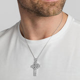 a male model wearing heavy silver celtic cross pendant from Solvar