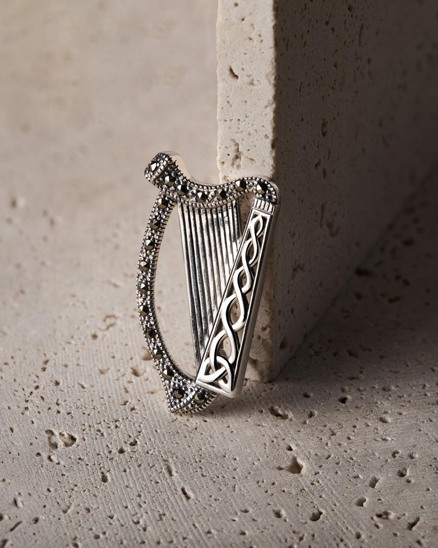 lifestyle image of  marcasite Irish Harp brooch in silver