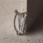 lifestyle image of  marcasite Irish Harp brooch in silver