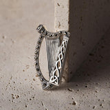 lifestyle image of  marcasite Irish Harp brooch in silver