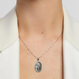 green marble oval Tree of life necklace on a model