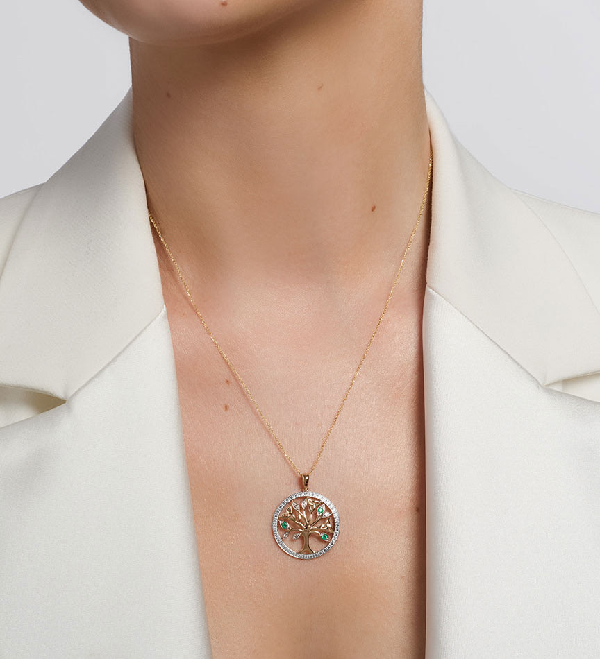 a model wearing gold irish tree of life necklace s46105
