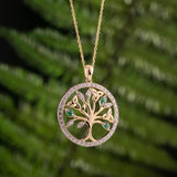 lifestyle image of irish tree of life necklace on green background
