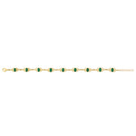 Product shot showing ladies emerald set Trinity Knot tennis bracelet laid out in its open state.