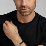 male model wearing black leather Celtic bracelet from Solvar