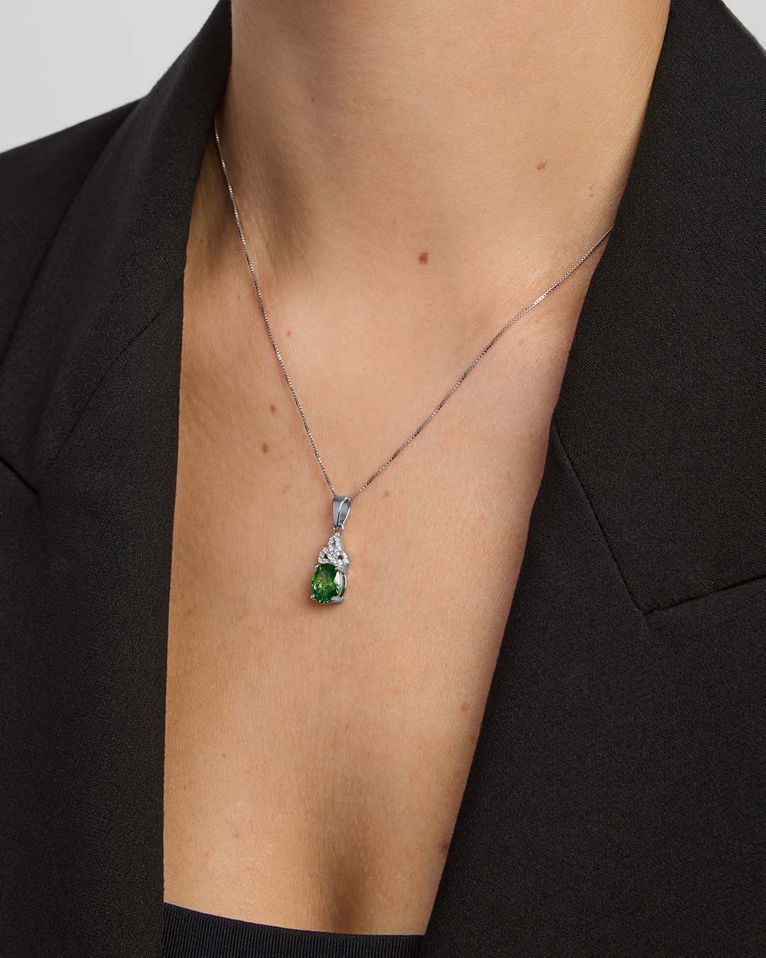 a model wearing May Birthstone Trinity Knot Necklace S46948-05