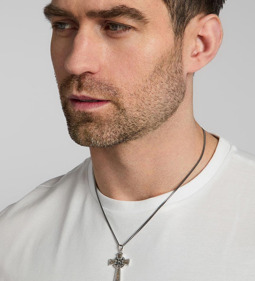 a male model wearing mixed metal Celtic Cross pendant from Solvar