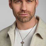 male model wearing large gold and silver Celtic cross necklace from Solvar