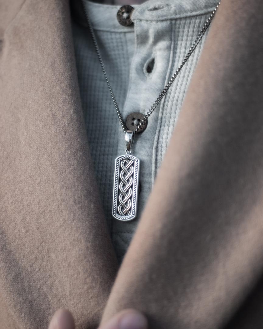 closeup image of silver Celtic knot ingot pendant from Solvar