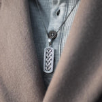 closeup image of silver Celtic knot ingot pendant from Solvar