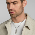 a male model wearing silver Celtic Knot ingot pendant from Solvar