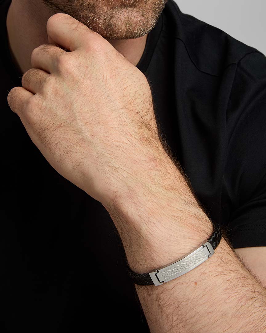 closeup image of men's black leather Celtic Knot bracelets from Solvar