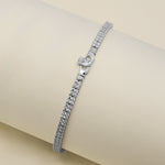 lifestyle image of multi cz Claddagh tennis bracelet from Solvar