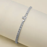 lifestyle image of multi cz Claddagh tennis bracelet from Solvar