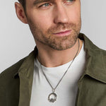 male model wearing silver Celtic Claddagh pendant from Solvar