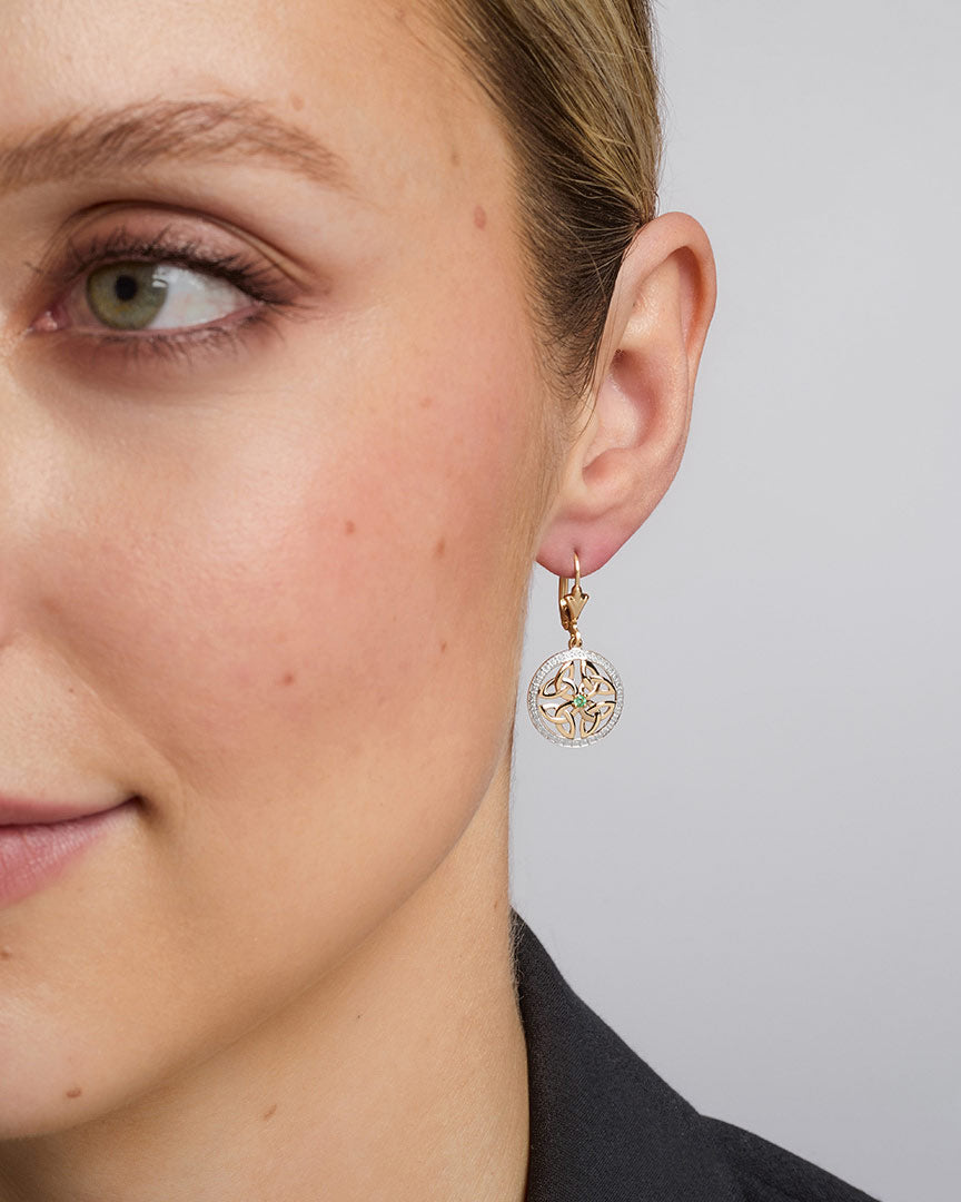 14K gold emerald round trinity knot earrings s33951 on a model 1