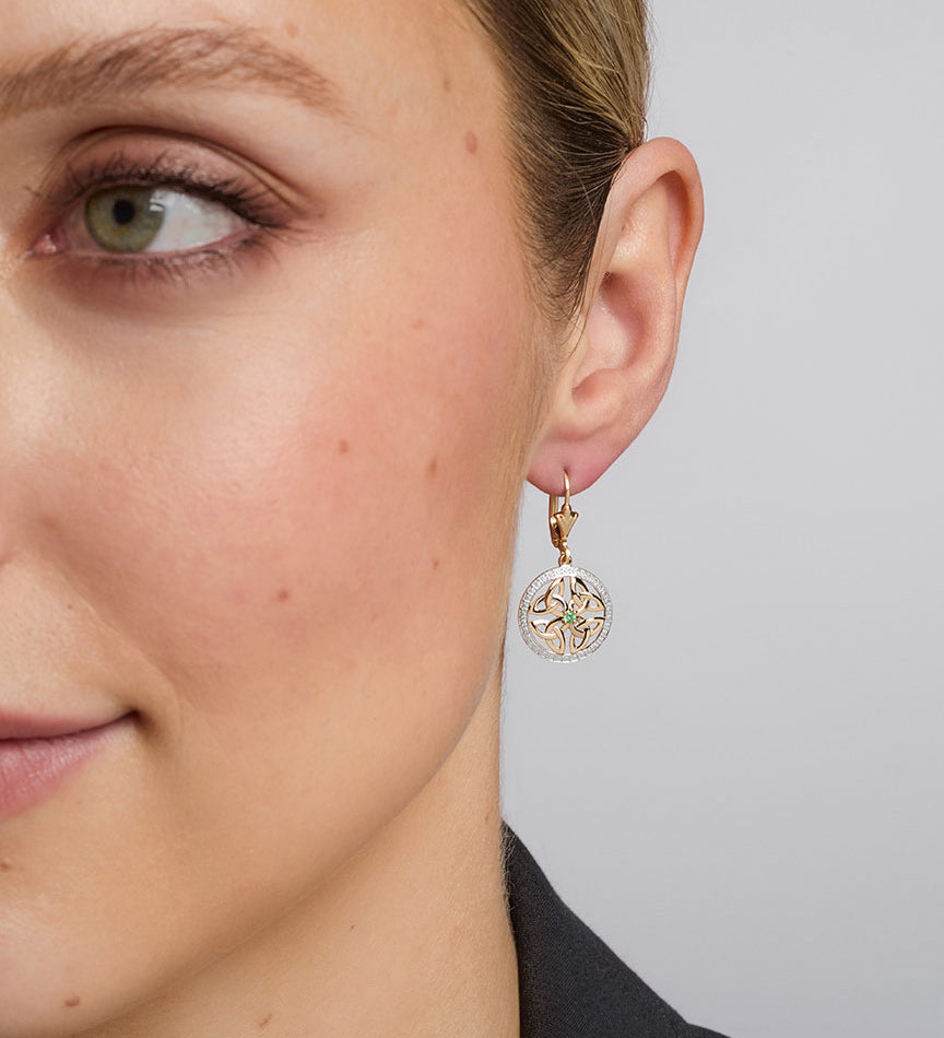 14K gold emerald round trinity knot earrings s33951 on a model 1