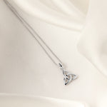lifestyle image of kid's Celtic Trinity Knot necklace in silver 