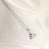 lifestyle image of kid's Celtic Trinity Knot necklace in silver 