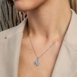 a female model wearing silver shamrock pendant from Solvar